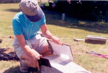 An example of the effective use of a mirror to redirect light onto a stone for reading