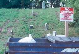 Here's one of our favorites... Concern about the dumpster being under surveillance, but no one paying attention to the encroachment on the adjacent cemetery... 